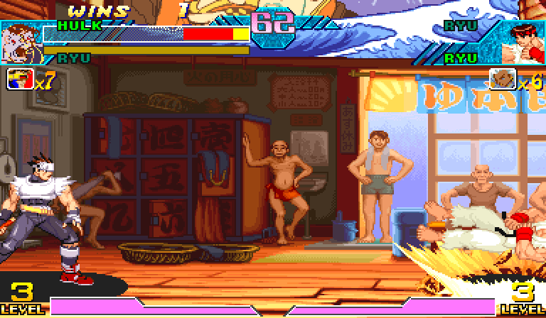 The end of a round in the render probe: the game announces HULK RYU WIN while Hayato's sprite performs the win pose