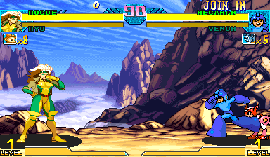 Rogue standing in Marvel vs. Capcom against Strider Hiryu. HUD word ROGUE, partner Ryu, Hulk portrait leftover