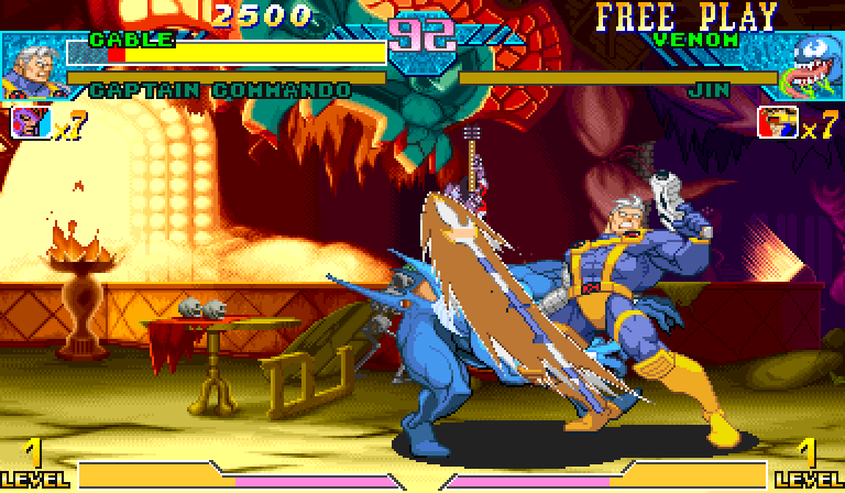 Live Marvel vs Capcom capture of Cable swinging a long energy blade through Venom